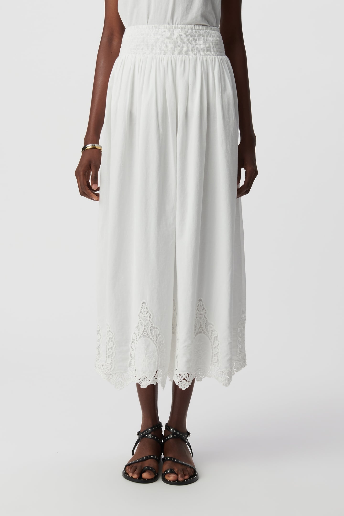 LONG WHITE SKIRT DECORATED WITH LACE EMBROIDERY 2