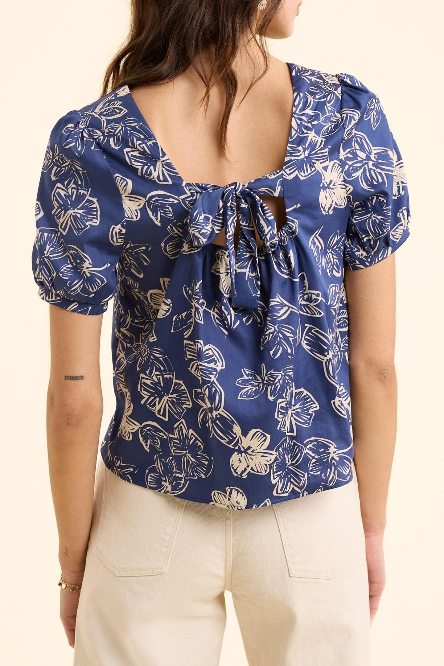 NAVY TOP WITH XL FLORAL PRINT AND BOW ON BACK INDIGO 5